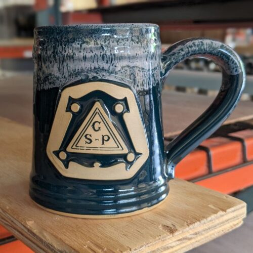 green custom coffee mug with logo