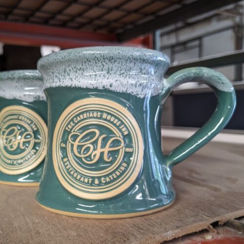 teal custom coffee mug with logo