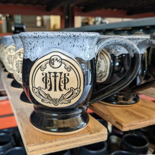 black custom coffee mug with logo