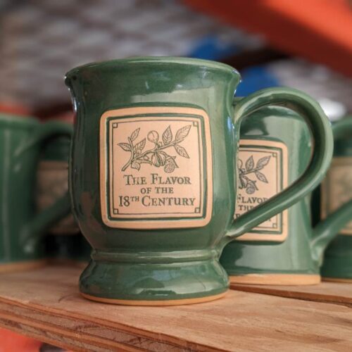 green custom coffee mug with logo