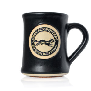 Black stoneware mug with logo.