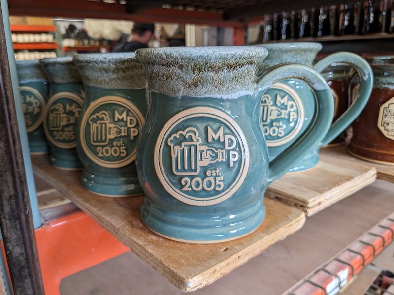 Light blue beer steins with logo imprint graphic of a beer stein and the words "MDP 2005".