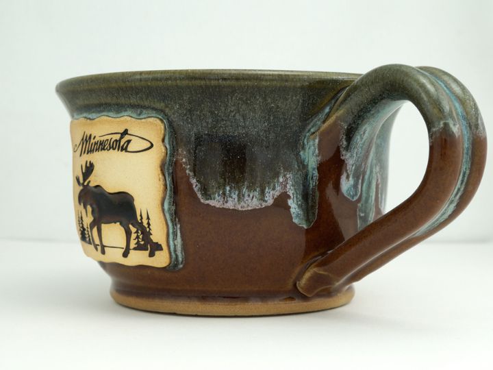 Pottery soup mug personalized with nature artwork.