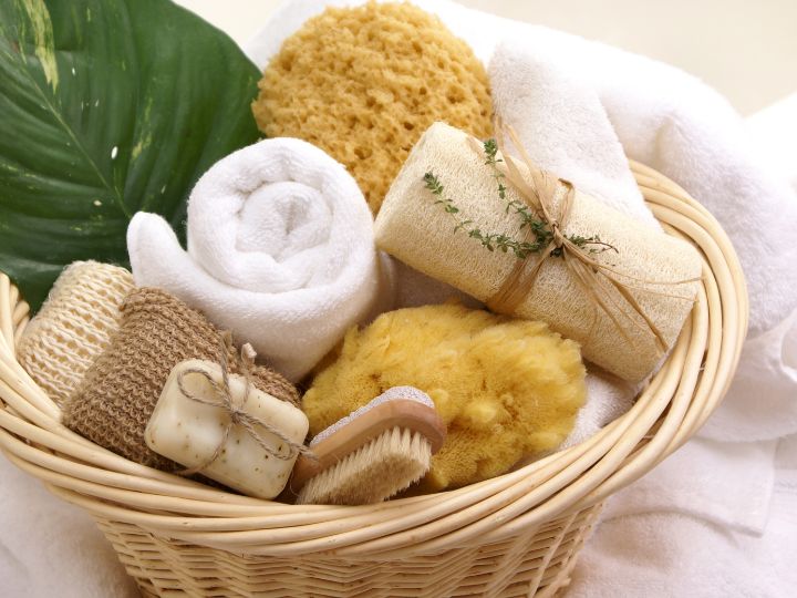 wood basket filled with items for a spa